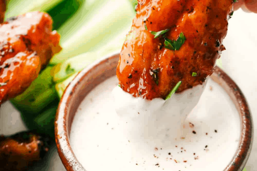 Air Fryer Chicken Wings with Honey Buffalo Sauce