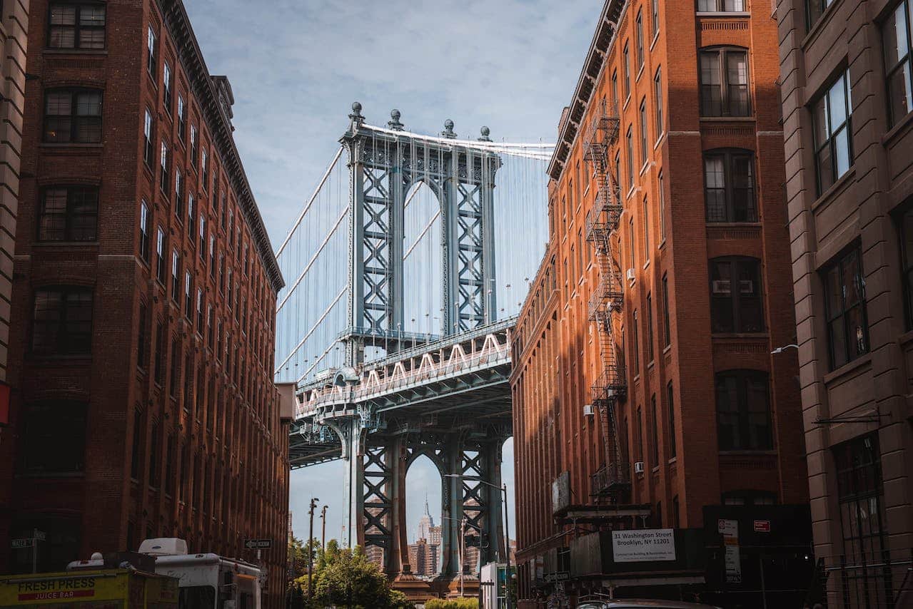 A view of the Brooklyn Bridge through buildings