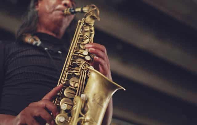 Close-up of a man playing a saxophone
